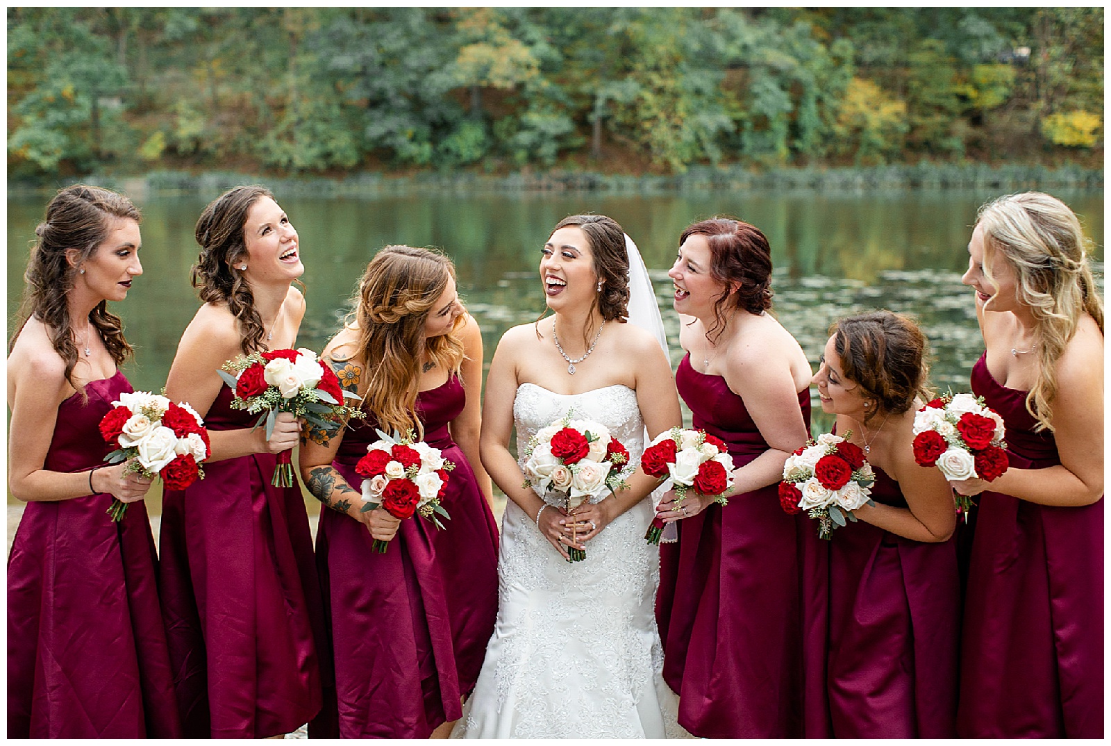 Bride and bridesmaids in burgundy dresses