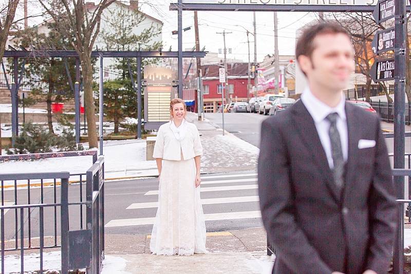 First look between a bride and groom in the city