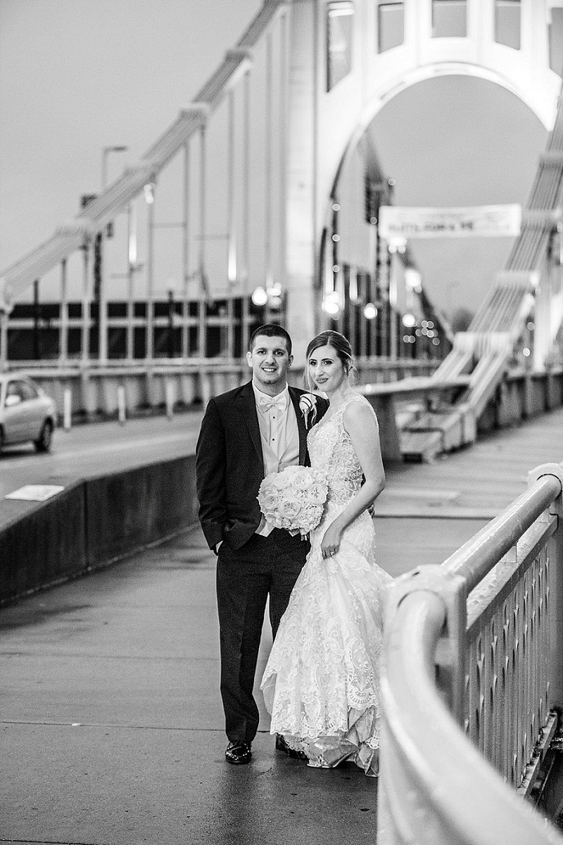 bride and groom outside pittsburgh hotel wedding