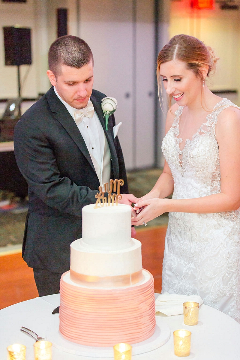 cutting the cake at pittsburgh hotel wedding