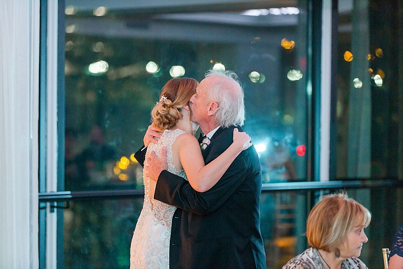 father daughter embrace at pittsburgh hotel wedding